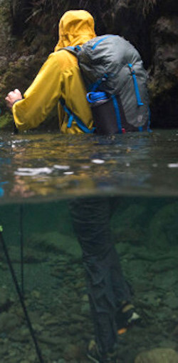 river hiking fully clothed